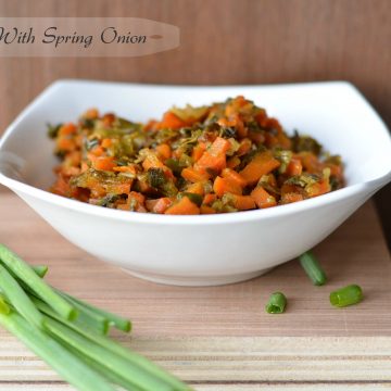 Carrot spring onion dry curry is prepared using green onions and carrots. This combination tastes amazingly heavenly must say, it has the sweetness of carrots with the pungent flavors of spring onion mixed with few spices. A perfect side dish with chapati or rice which does not take much time to cook.