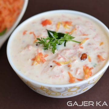 Carrot raita or gajar ka raita is prepared by mixing grated carrot in curd with some spices. It is great to have with stuff parathas instead of simple curd.