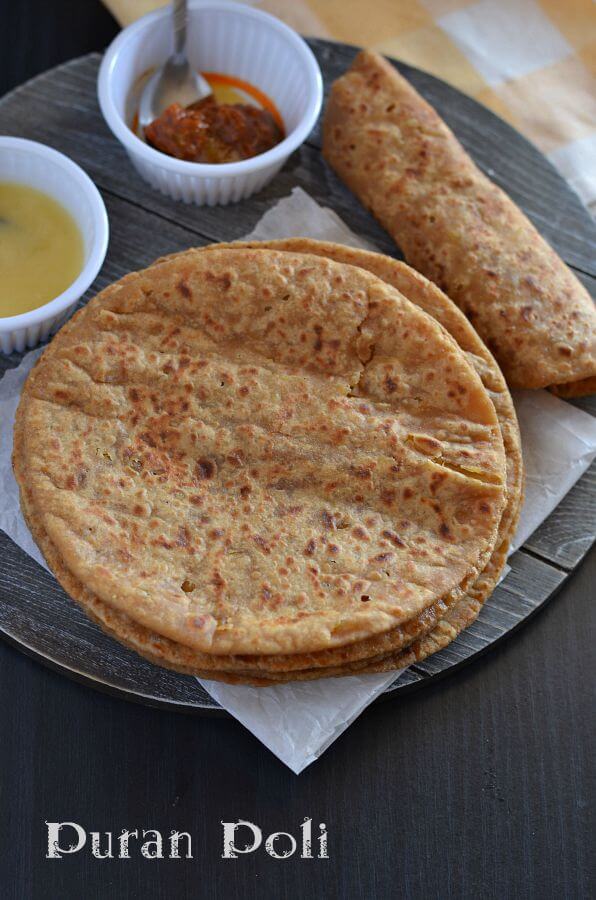 Puran Poli is a Maharashtrian lentil stuffed sweet flatbread made with whole wheat flour and chana dal (bengal gram) filling. It is prepared on festive occasions such as Ganesh Chaturthi, Holi, Diwali, Janmashtami, and Gudi Padwa.