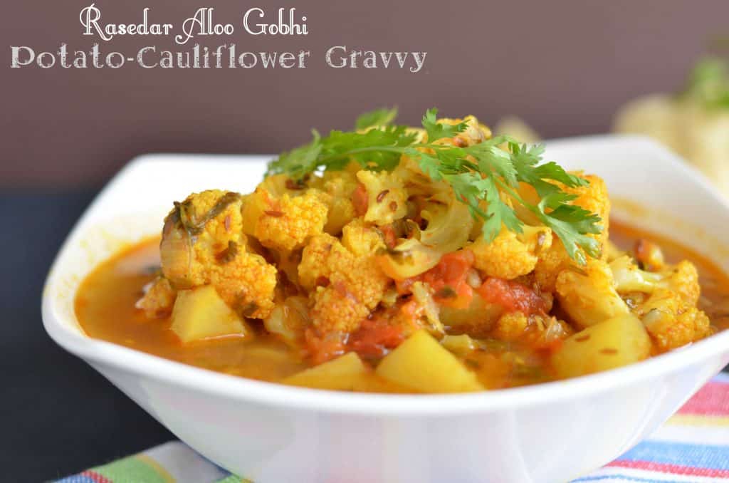 Rasedar aloo gobhi is very simple to cook and a one pot meal. You can cook it in a pressure cooker or instant pot or in kadhahi. Flavored with tomato and spices this gravy is rich as well as full of taste.