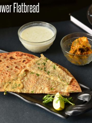 Gobhi Paratha or cauliflower stuffed flatbread is one of the famous breakfasts in North India. Filled with the goodness of cauliflower, this aromatic paratha is served in breakfast especially in winter season.