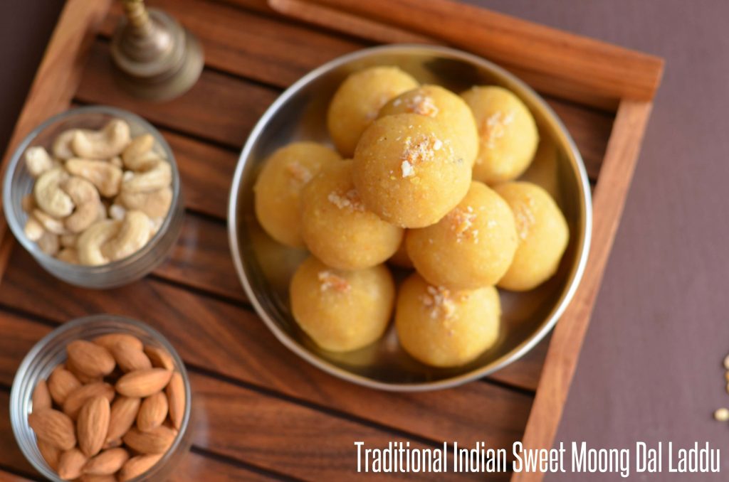 Moong dal laddu is a traditional Indian festive sweet. Often prepared on Holi, Diwali, Janamashtmi or any special occasion throughout the year. Moong ki dal ke laddu is easy to make dessert with just three ingredients moong dal or yellow lentil, sugar, and ghee or clarified butter.
