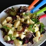 This apple walnut salad brings you sweet and tangy flavors with greens. Very simple and easy to make. Just add a dash of lemon, a little quantity of maple syrup with some salt and you are set to munch on this apple walnut salad.
