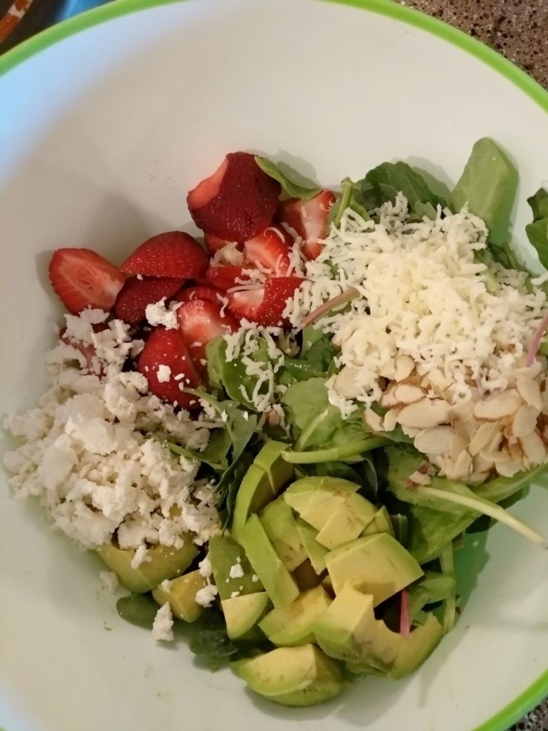 This strawberry avocado spinach salad packed with healthy fats and loads of nutrients. With juicy strawberries, crunchy nuts, tangy feta cheese and with greens your healthy summer salad is ready.