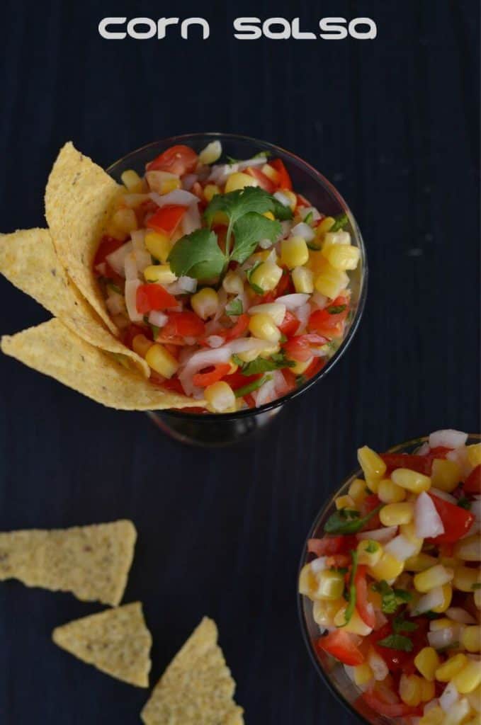 This corn salsa is quite easy to make, combining sweet corn, chopped tomato, onion, serrano chili, cilantro and a dash of lime juice. This is a perfect recipe for nachos or adds on in a burrito bowl. Even it is a kind of salad which will go perfectly for snack time or with your rice recipes.