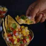 This corn salsa is quite easy to make, combining sweet corn, chopped tomato, onion, serrano chili, cilantro and a dash of lime juice. This is a perfect recipe for nachos or adds on in a burrito bowl. Even it is a kind of salad which will go perfectly for snack time or with your rice recipes.