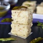 Oats dhokla is the instant dhokla recipe with oats flour, semolina and curd in equal portions, which is a savory and steamed snack or a great breakfast or a great meal in itself. Seasoned with mustard seeds, curry leaves and green chilies this oats dhokla is a perfect guilt-free food to consume.