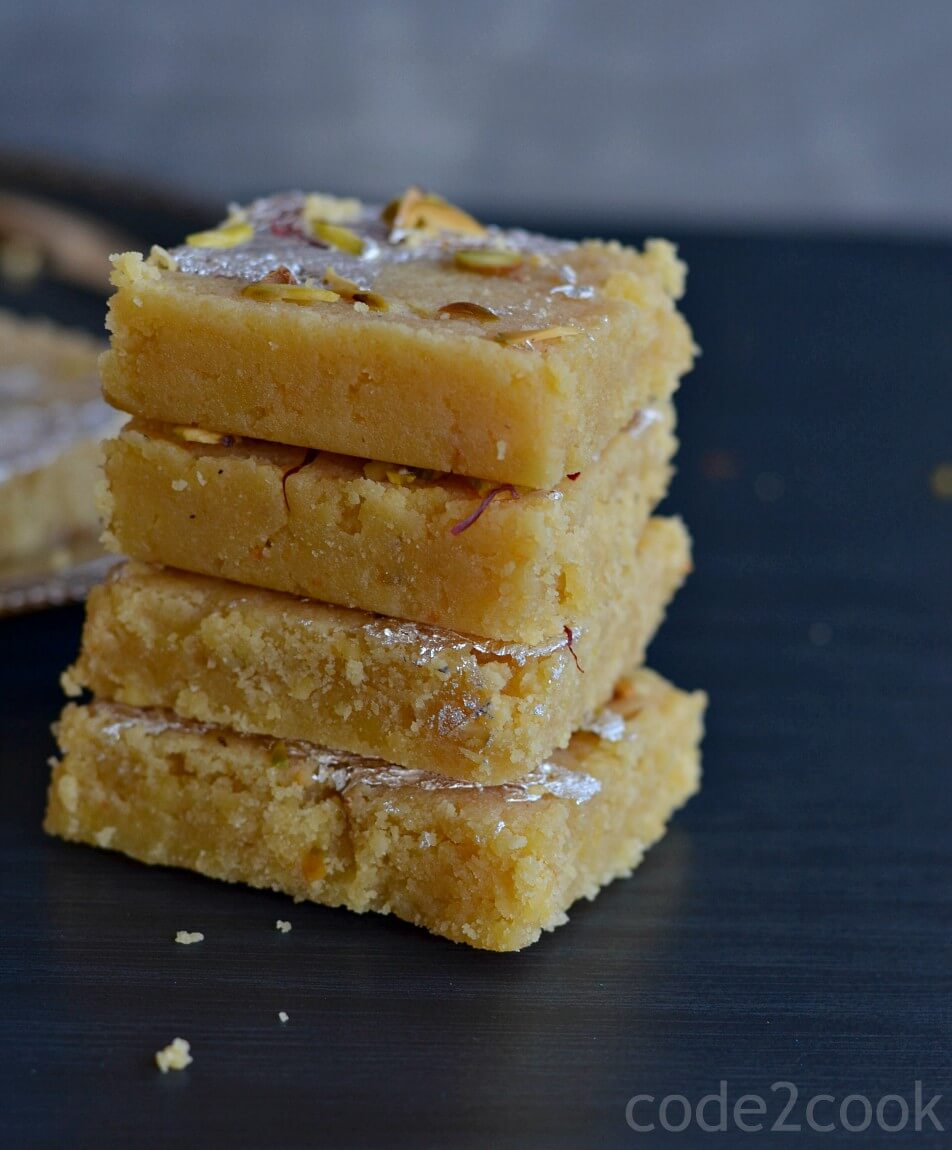 Moong Dal Barfi is a traditional Indian delicacy prepared with moong dal or yellow lentil. This is a fudgy, grainy sweet and a bit tricky to make at home. Yellow lentil is gluten-free so this barfi is perfect for those who are allergic to gluten.