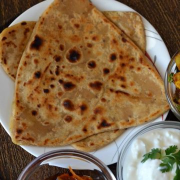 Ajwain paratha is a simple Indian flatbread served with curry, dal or simply pair up with curd or pickle. Even you can have them with tea which makes a perfect combo altogether. Apart from ajwain paratha, you can make ajwain poori and ajwain roti with the same dough. They are great for breakfast or dinner and lunch.