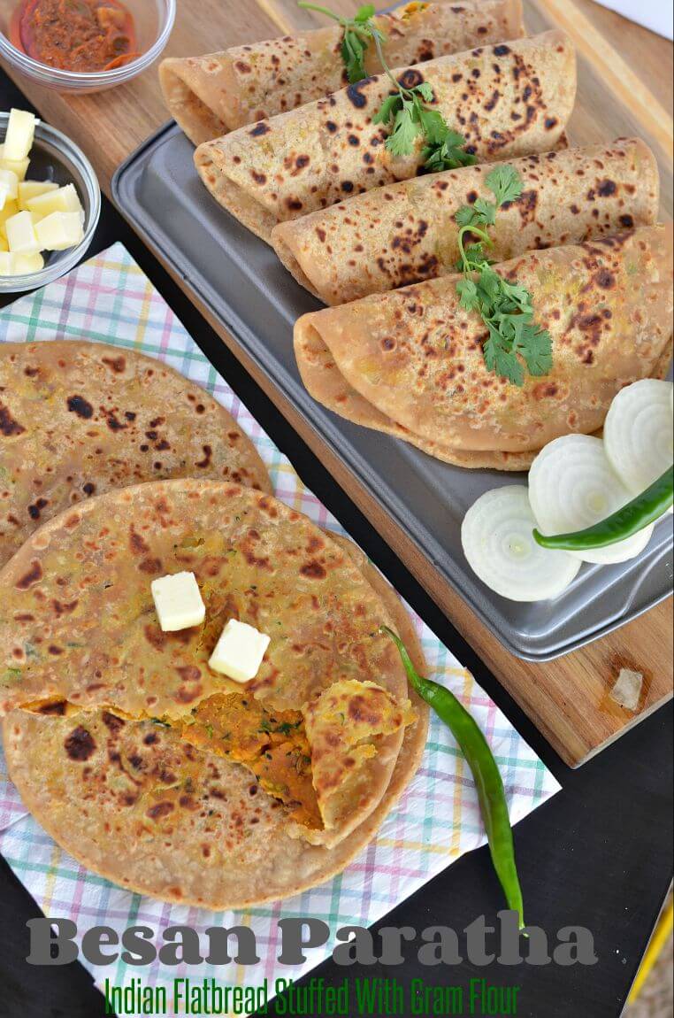 Besan paratha or masala besan paratha is a wonderful Rajasthani paratha recipe which is prepared by stuffing spicy besan or gram flour filling in the whole wheat dough. This paratha is crispy, aromatic and filled with the pickled flavor besan stuffing makes a wholesome meal.