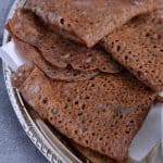 Ragi Rava Dosa is a quick and easy dosa recipe for breakfast, which requires no fermentation. This instant ragi rava dosa or crepe is made with ragi which is known as finger millet flour, rice flour, and semolina. Ragi rava dosa is a healthy, nutritious, quick Indian breakfast recipe.