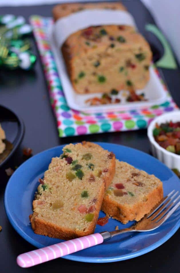Whole wheat Tutti Frutti cake is eggless, easy to make, soft, moist and a perfect tea time cake. This is a no fail eggless tutti frutti cake recipe to make at home.