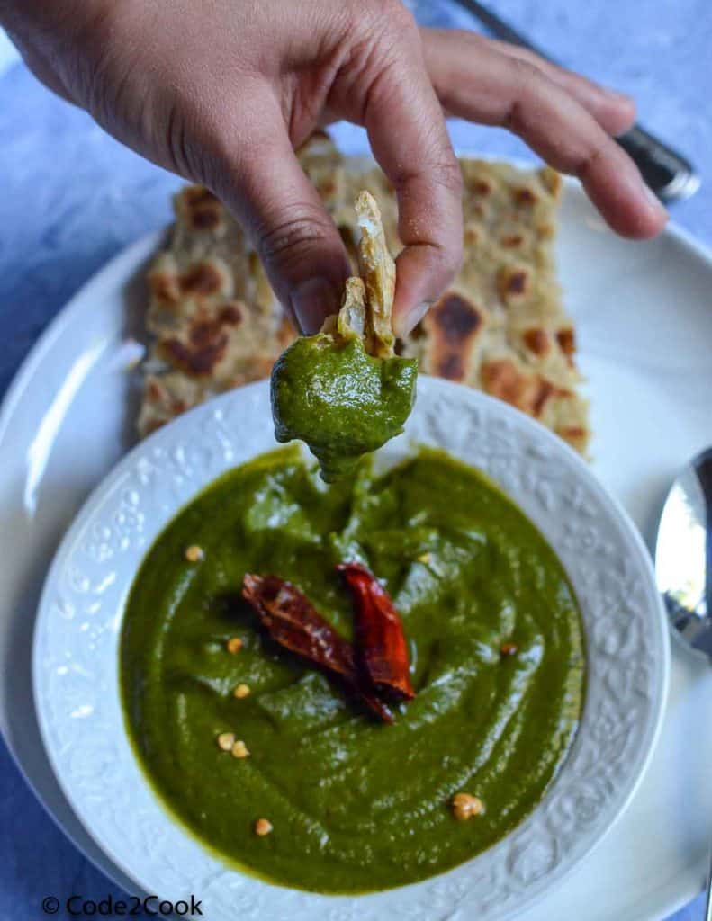 paratha is served with spinach chutney